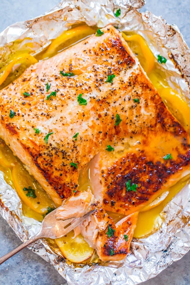 Sheet Pan Lemon Garlic Butter Salmon — Juicy salmon at home in 30 minutes that's EASY and tastes BETTER than from a restaurant! The butter is infused with lemon and garlic and adds so much FLAVOR! Sheet Pan Lemon Garlic Butter Salmon — Juicy salmon at home in 30 minutes that's EASY and tastes BETTER than from a restaurant! The butter is infused with lemon and garlic and adds so much FLAVOR!