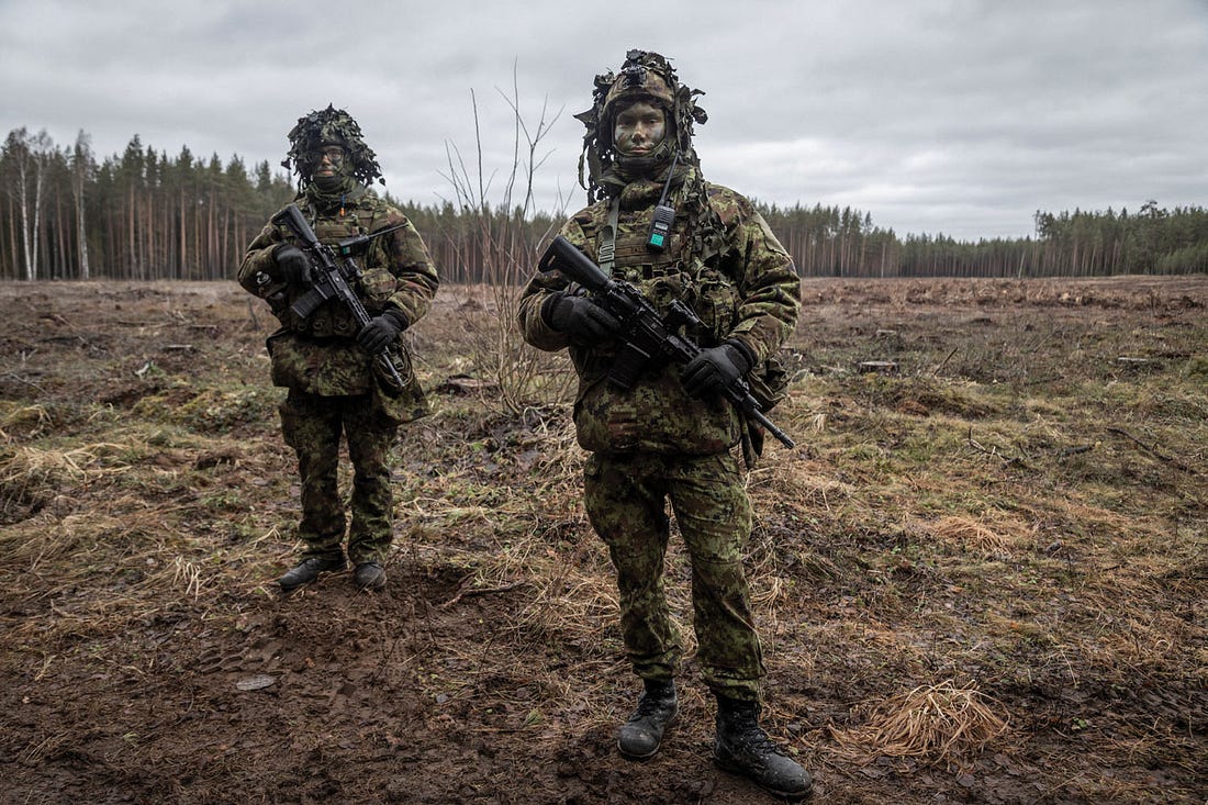 Conscripts of the Kalev Infantry Battalion during a training exercise in the forest near the Russian border. Võru, Estonia, March 2025.