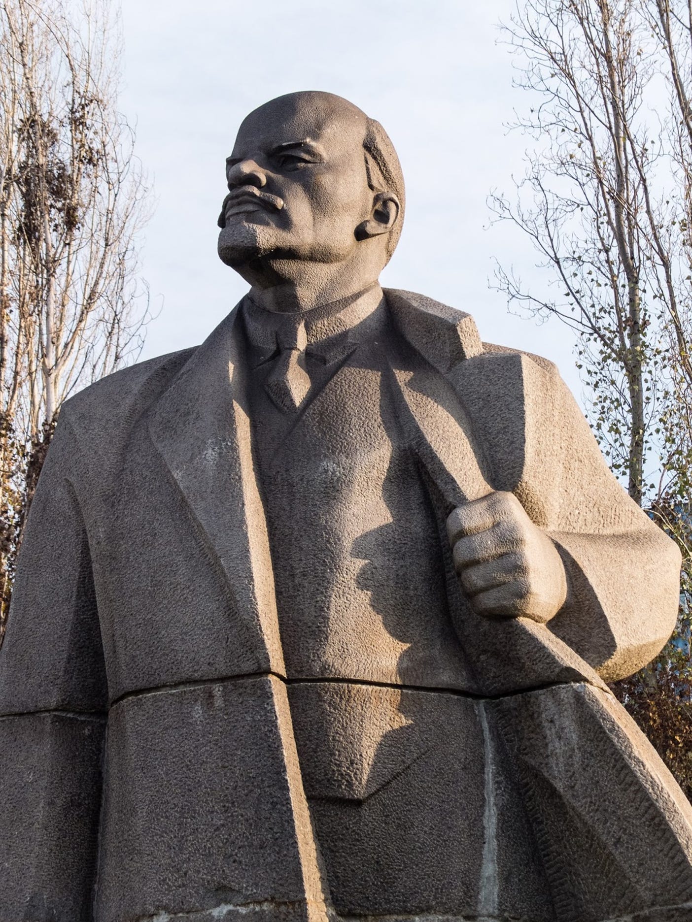 A statue of a person in a suit
AI-generated content may be incorrect.