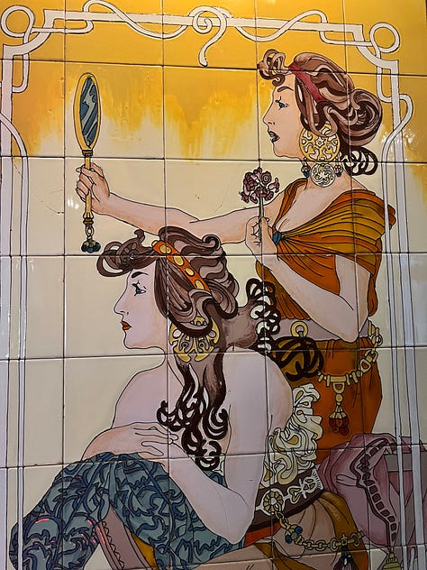 Three photos from Bouillon by Moulin: a glass of white wine and a kir royale on the counter, a decorative tile mural of a woman with a hand mirror, and a vintage Marcadet Poissonniers sign above the bar.