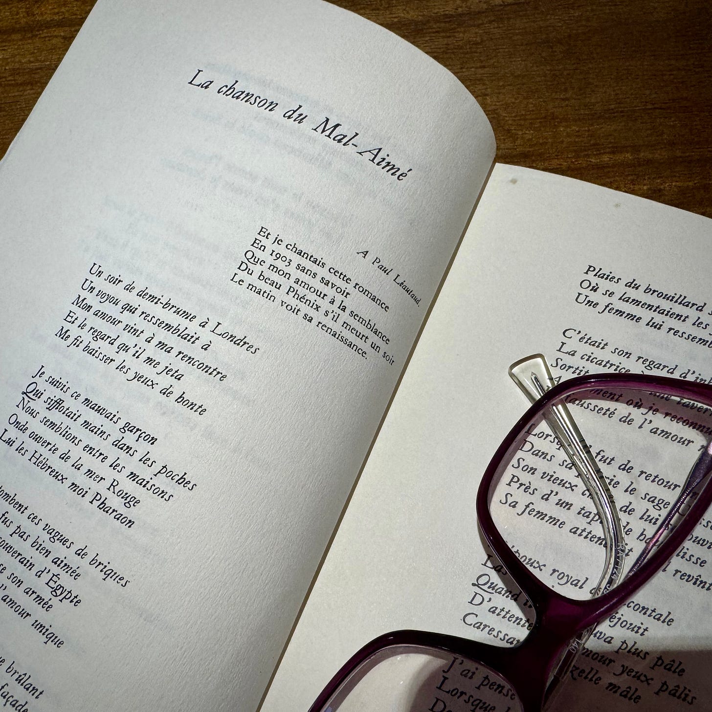 The Gallimard edition of Alcools by Guillaume Apollinaire, open to the first page of "La chanson du Mal-Aimé"