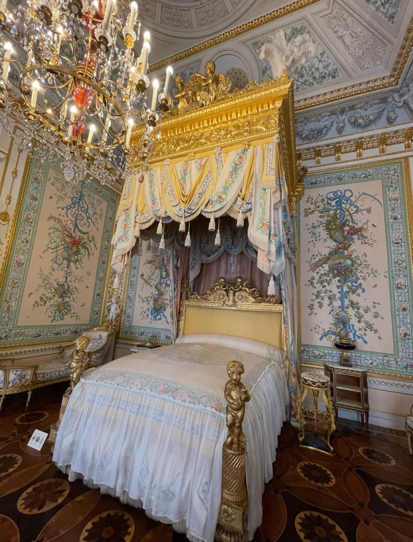 May be an image of bed and bedroom