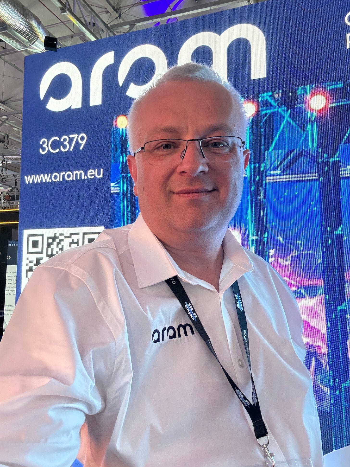 Rafał Mrzygłocki at ARAM booth at Prolight + Sound 2025 – discussing the future of execution in event production Rafał Mrzygłocki at ARAM booth at Prolight + Sound 2025 – discussing the future of execution in event production