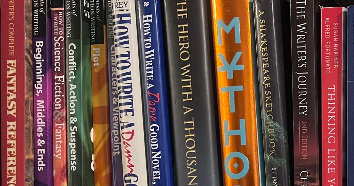 Bookshelf with a collection of novel writing reference books