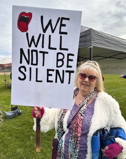 We will not be silent protest sign