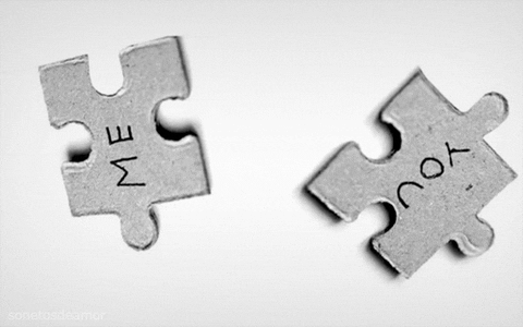 Two puzzle pieces that fit together perfectly, "ME" and YOU".