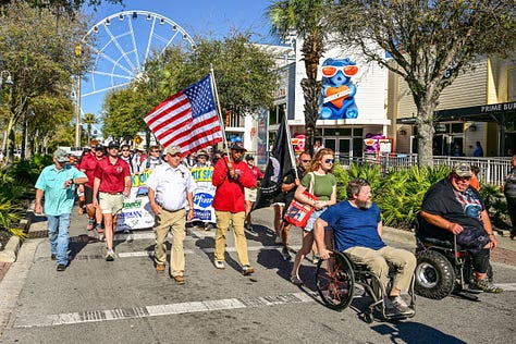 Troy University’s chapter of Alpha Tau Omega finished their 128.3-mile walk from the Troy quad to Panama City Beach on Wednesday. The fraternity raised $140,000 for Jeep Sullivan’s Wounded Warrior Outdoor Adventures. (PHOTO/Joey Meredith)