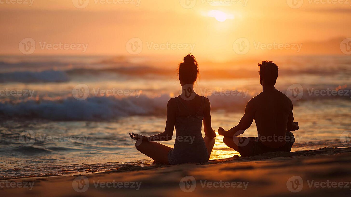 Serene Silhouetted Couple Meditating on Beach at Golden Sunset, Ocean Waves  Reflecting Warm Light 71784964 Stock Photo at Vecteezy