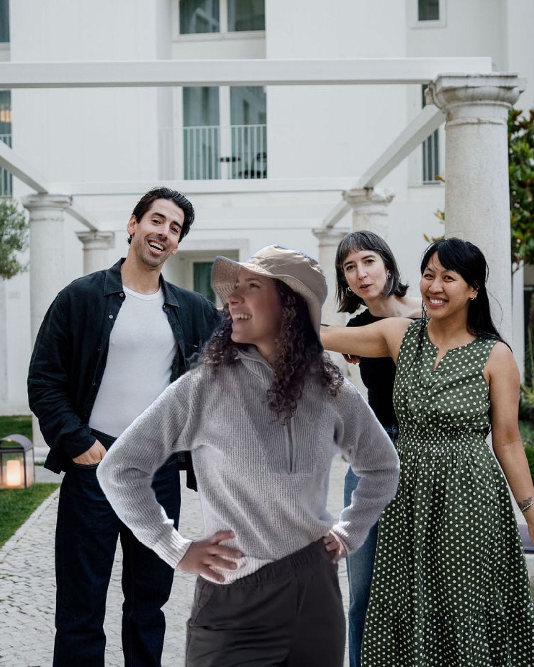 Four Slate team members posing outside a white building, with one teammate humorously photoshopped into the front of the group photo. Four Slate team members posing outside a white building, with one teammate humorously photoshopped into the front of the group photo.
