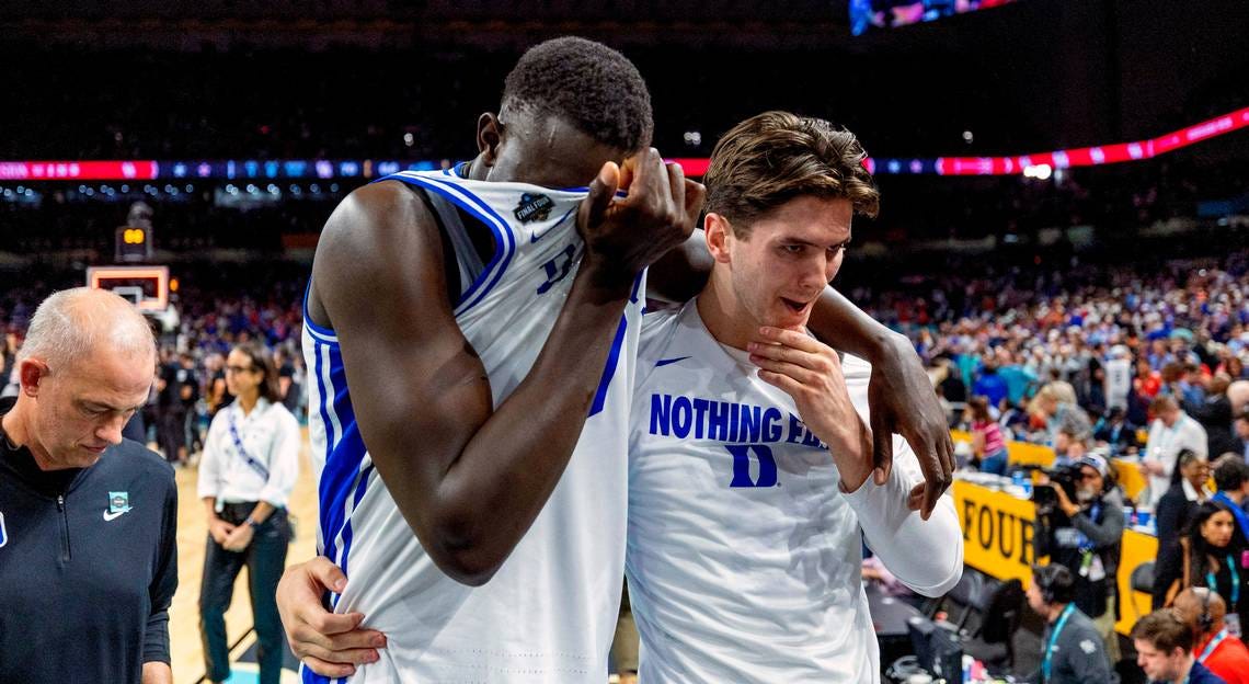 Khaman Maluach and Neal Begovich exit the court after Duke loses to Houston. Photo credit: Raleigh News & Observer. 2025. Khaman Maluach and Neal Begovich exit the court after Duke loses to Houston. Photo credit: Raleigh News & Observer. 2025.