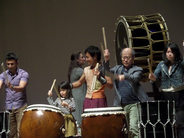 Me in Profile Playing the Big Drum Me in Profile Playing the Big Drum