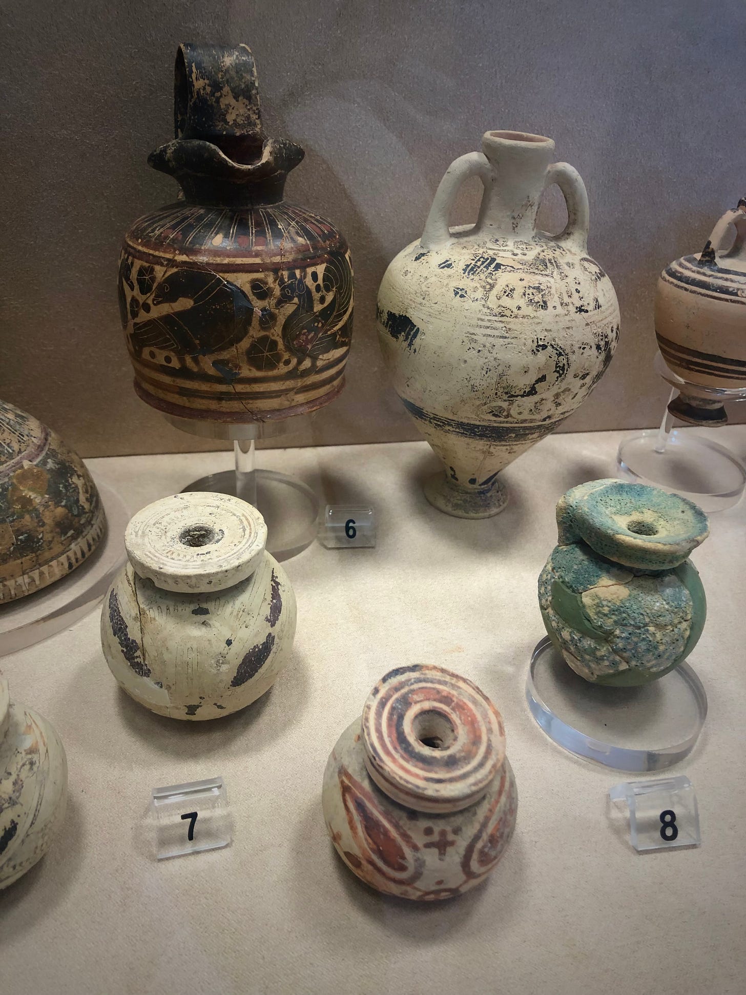 A group of ancient pottery

Description automatically generated