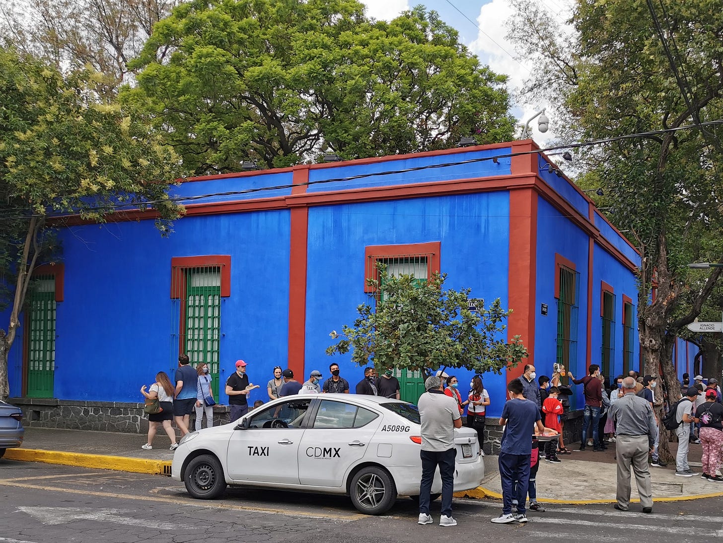 Frida Kahlo's blue house with people waiting outside