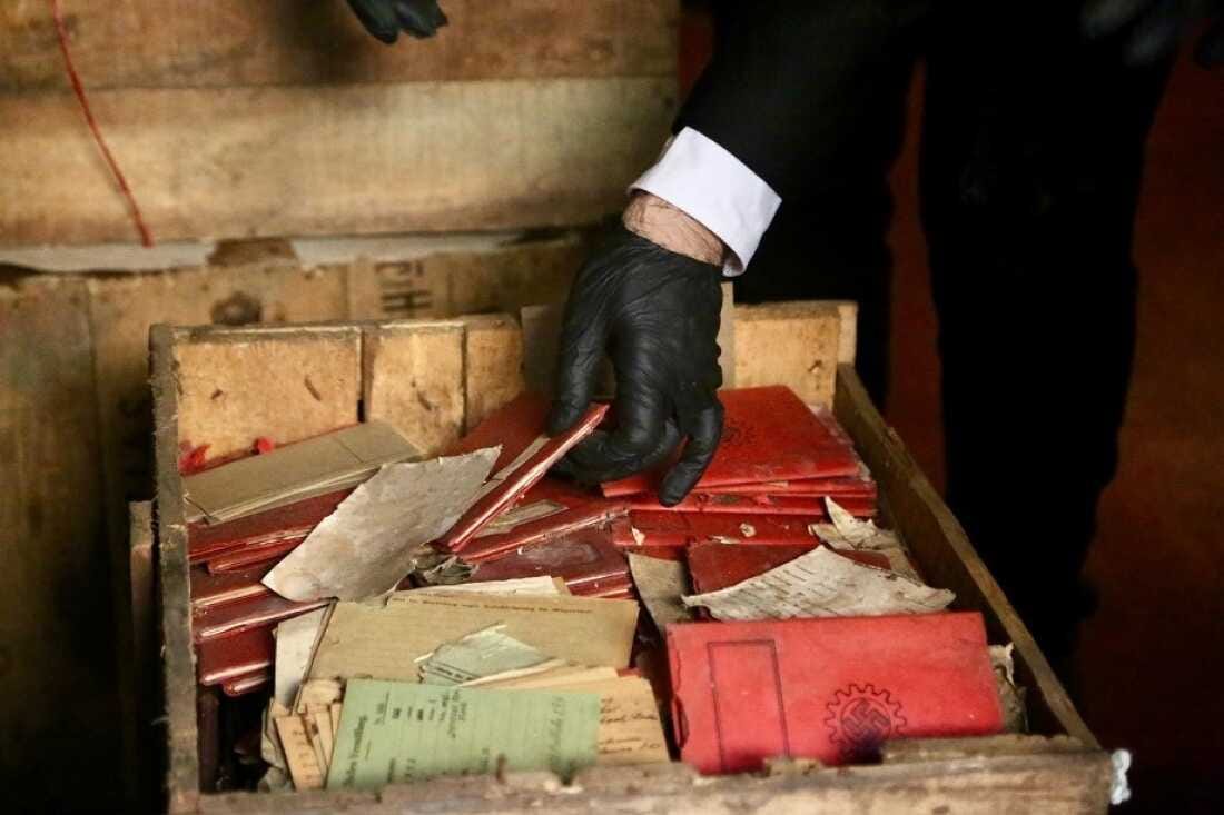 Documents unearthed from wooden crates in the basement of Argentina's top court included Nazi notebooks, photographs and postcards. Documents unearthed from wooden crates in the basement of Argentina's top court included Nazi notebooks, photographs and postcards.