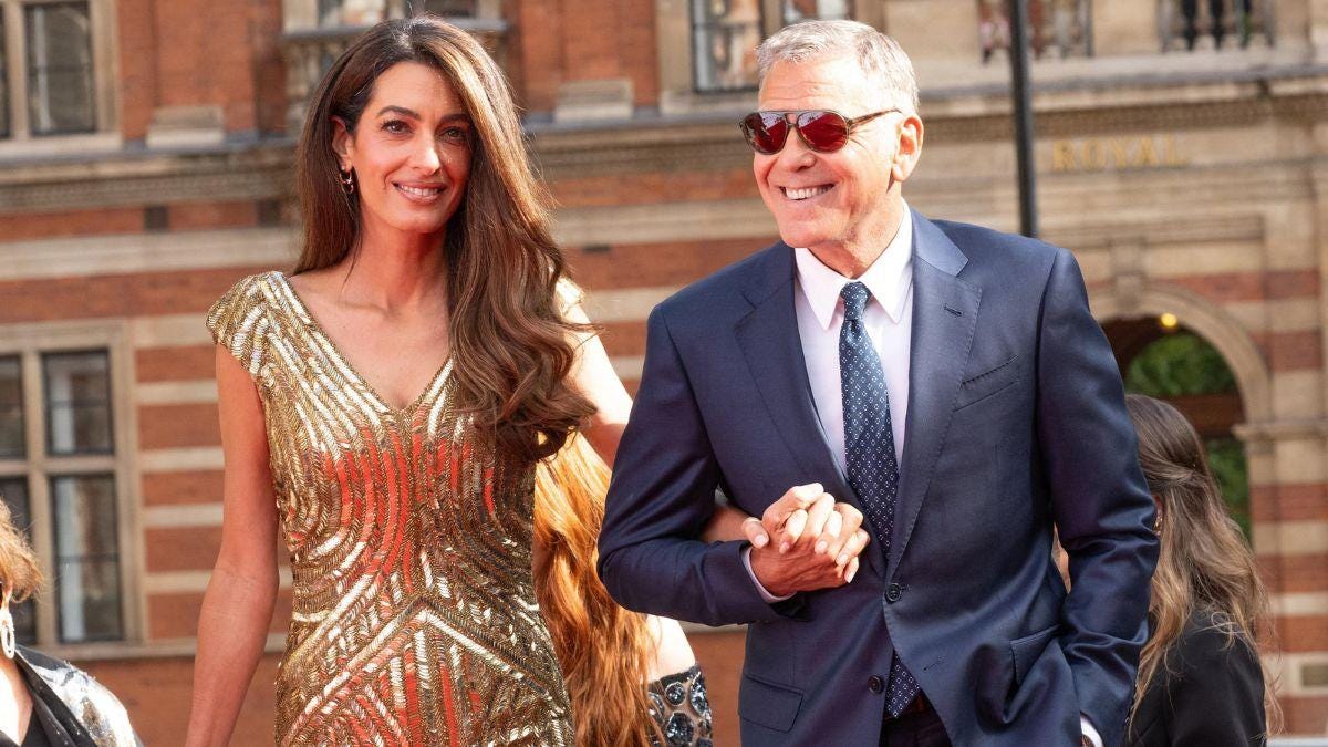 Photo of George and Amal Clooney Photo of George and Amal Clooney