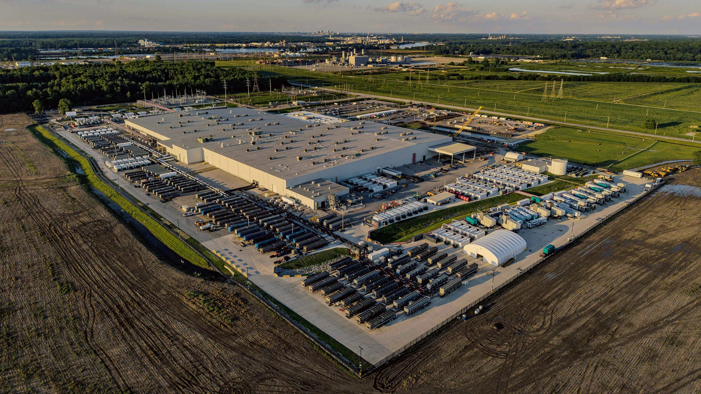 Aerial view of sprawling xAI data center and gas turbines Aerial view of sprawling xAI data center and gas turbines