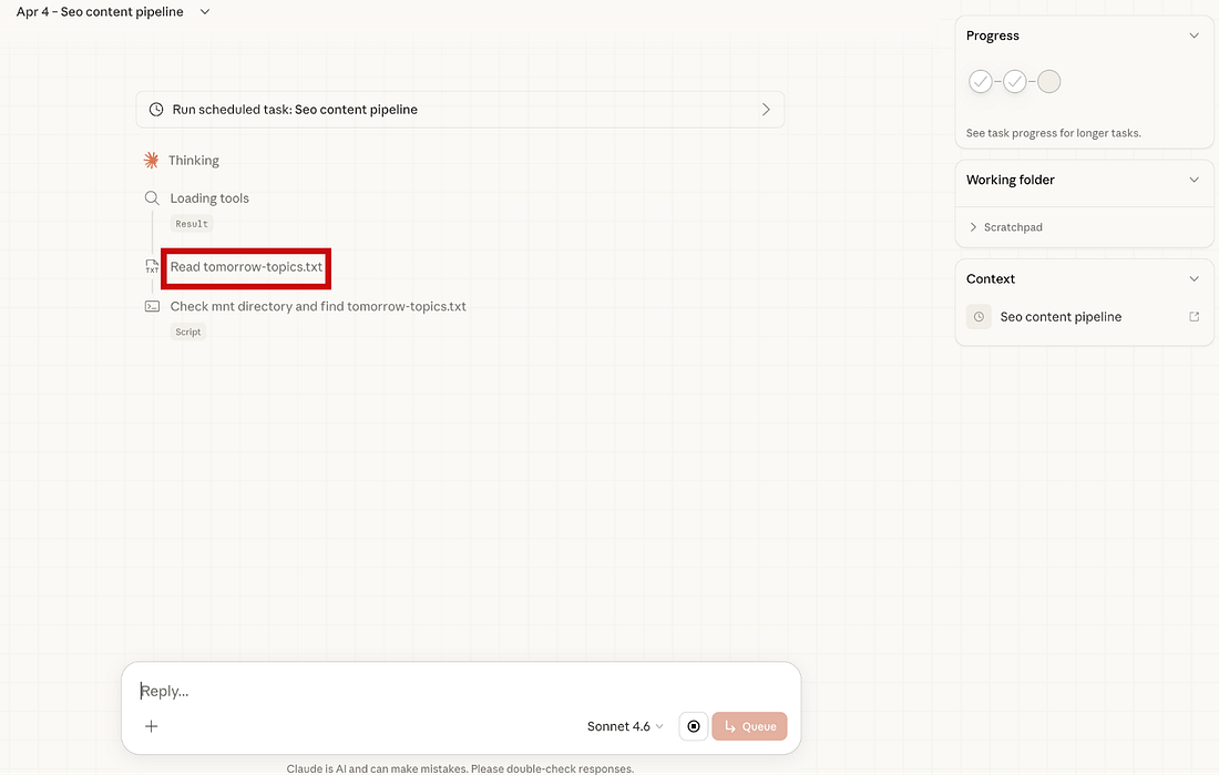 Claude Cowork task progress showing the automation reading the tomorrow-topics.txt file and extracting the content idea for processing