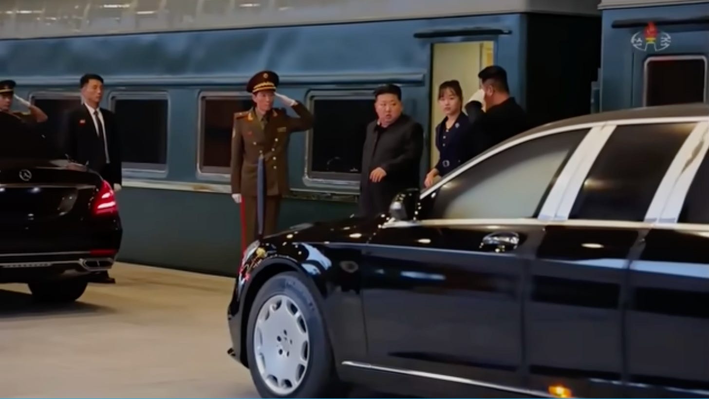 A group of people standing next to a car

AI-generated content may be incorrect.