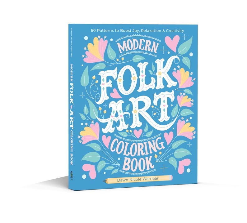May include: A blue book cover with the title "Modern Folk Art Coloring Book" in white lettering. The cover features a colorful floral design with hearts and a pencil.