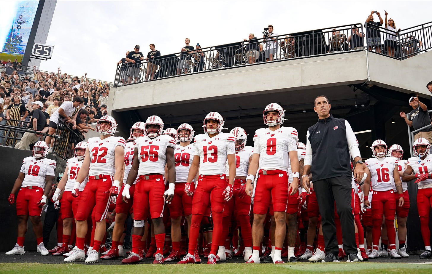 Wisconsin Badgers football; head coach Luke Fickell leads the Badgers onto the field.