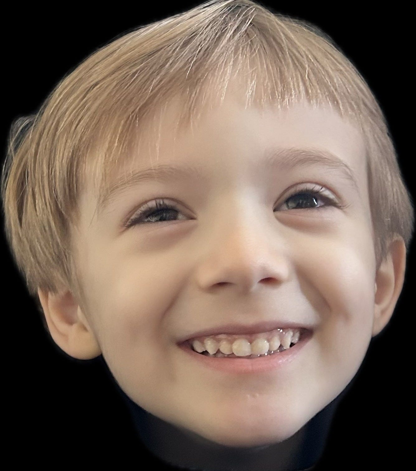 A head only photo of a young boy
