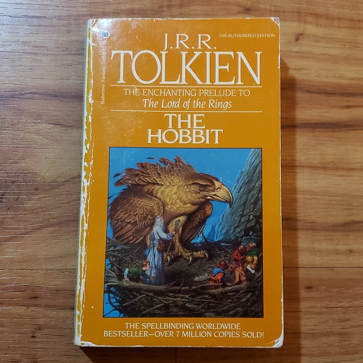 Photos of the cover and inside cover of my copy of The Hobbit.