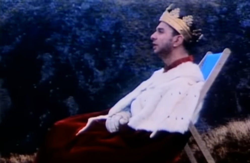 Video screenshot of David Gahan as the 'king' in the Depeche Mode 'Enjoy the Silence' video 