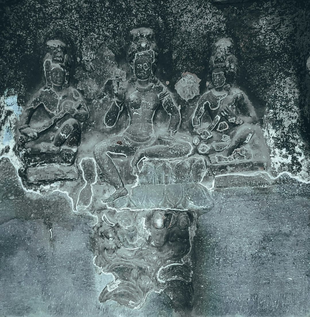 a picture of a group of people sitting on a bench