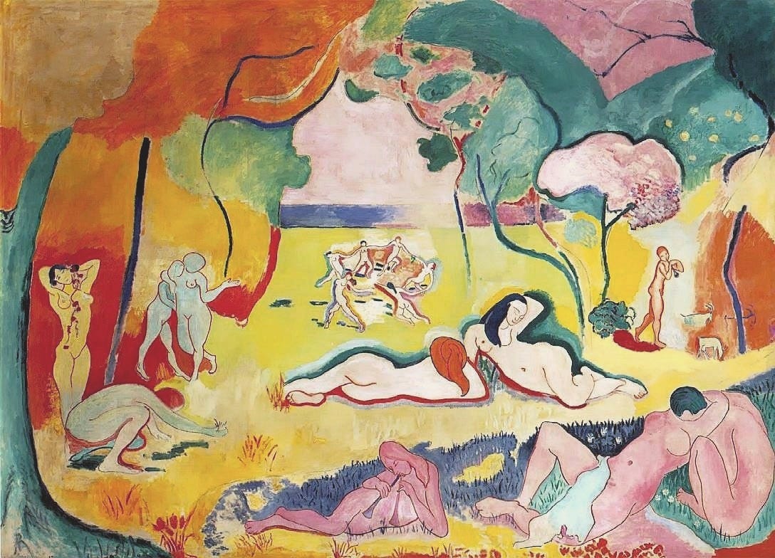 Matisse painting of nude figures dancing and reclining in a colorful landscape
