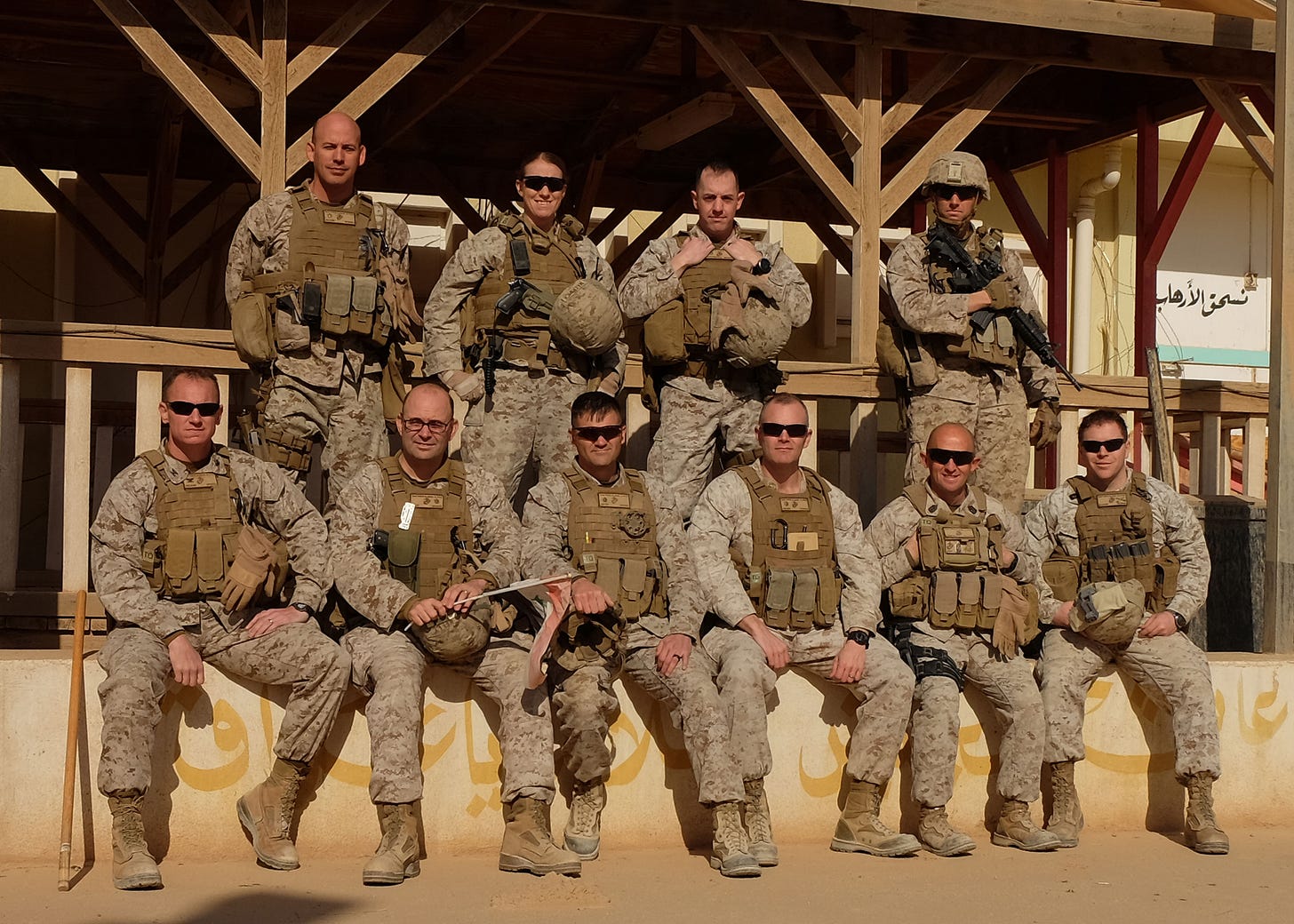 Task Force Lion staff pose for a group photo at Al Asad Air Base during deployment.