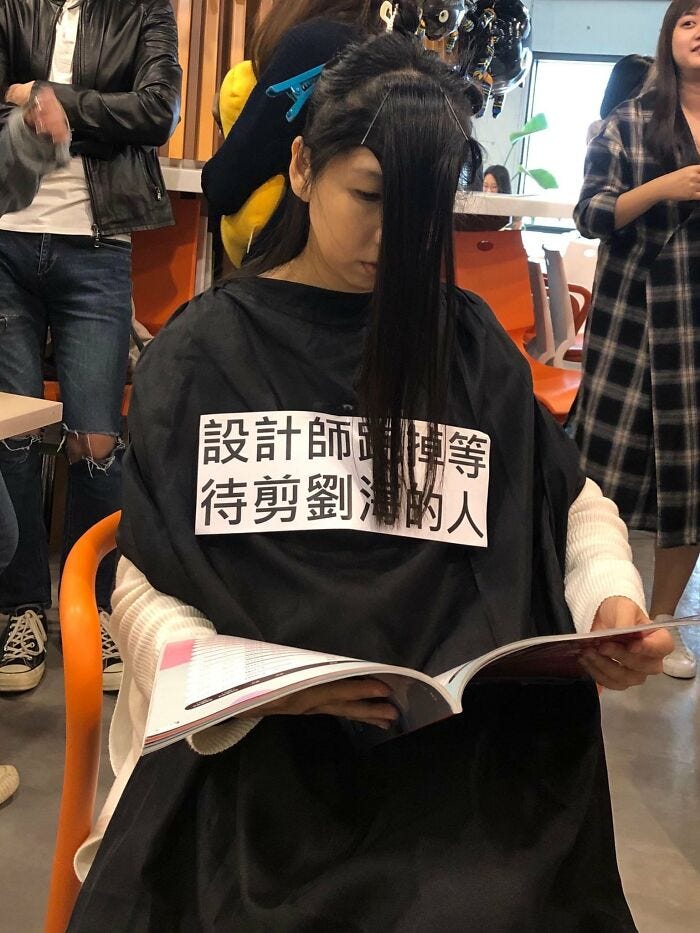 "The woman who’s having her bang cut but the hairdresser is nowhere to be found"