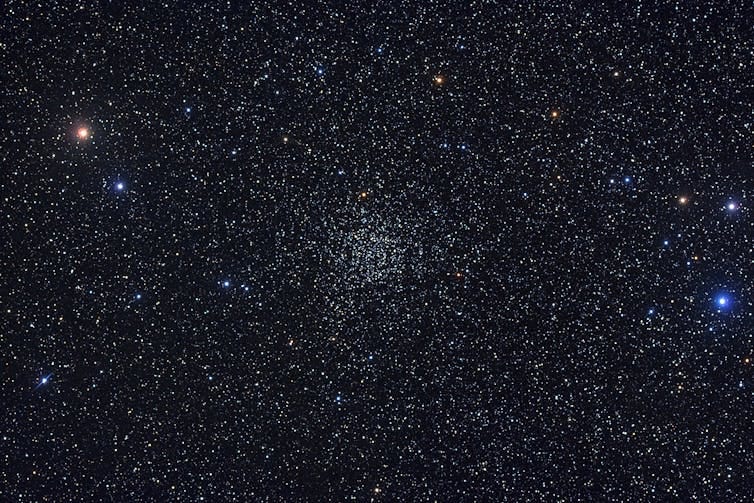 Photograph of a cluster of stars Photograph of a cluster of stars