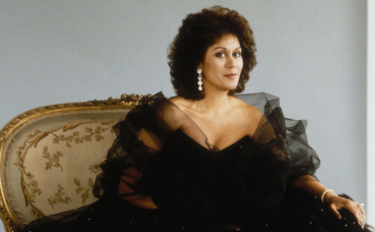 A person in a black dress

AI-generated content may be incorrect.