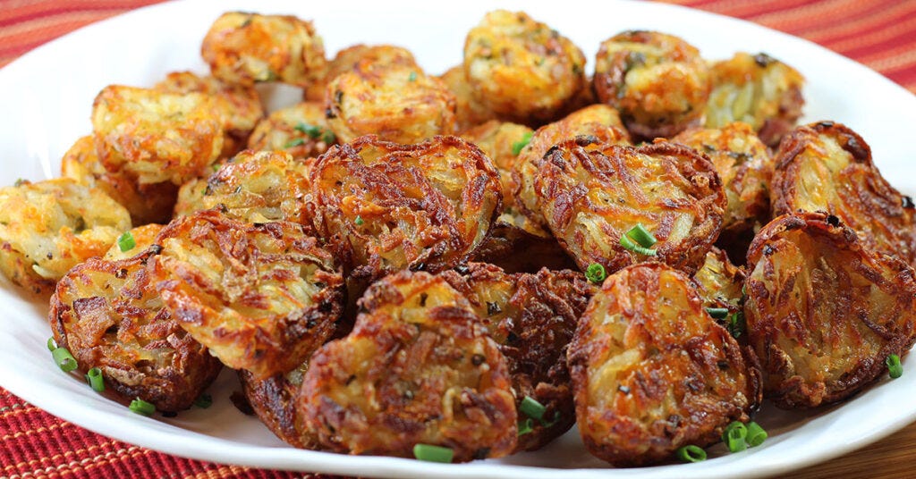 Make Them Fun! – If you have a shaped muffin tin, why not try it out? The muffin tin method for making tater tots leaves lots of room for being creative in the kitchen. We L♥VE using our heart-shaped mini muffin tin to make the tots extra filled with love. Let your creativity flow; there may be even more tin shapes that would work well too! Make Them Fun! – If you have a shaped muffin tin, why not try it out? The muffin tin method for making tater tots leaves lots of room for being creative in the kitchen. We L♥VE using our heart-shaped mini muffin tin to make the tots extra filled with love. Let your creativity flow; there may be even more tin shapes that would work well too!