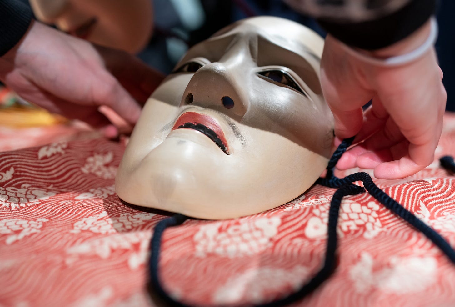A Japanese Noh mask, the way it is carved means its facial expression looks distressed from only that angle