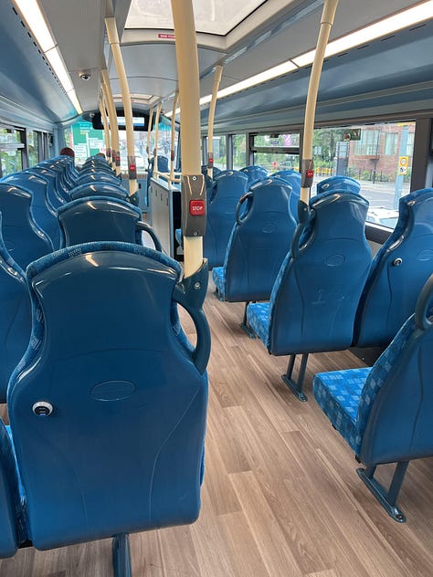 Photos showing upper deck of three bus operators with different seats and colour schemes.