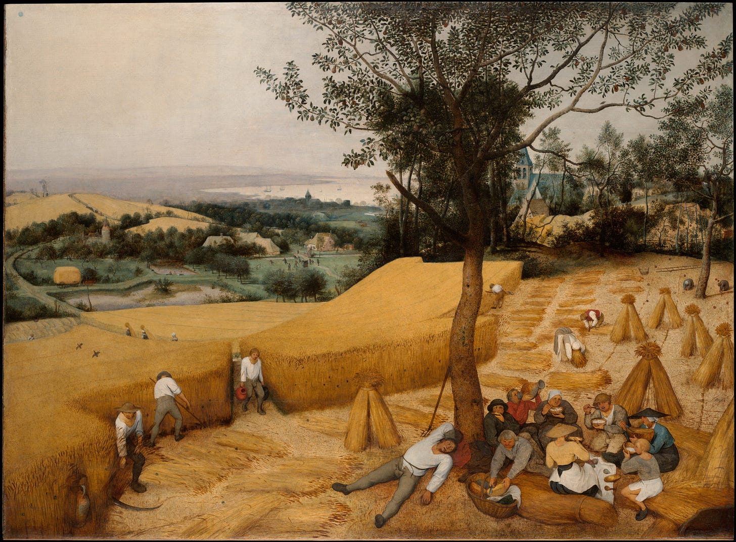 A golden field on a summer day. Harvesters cutting wheat and grass, making hay. People swimming in the background. Men and women picnicking in the foreground, while a man naps in the shade. 