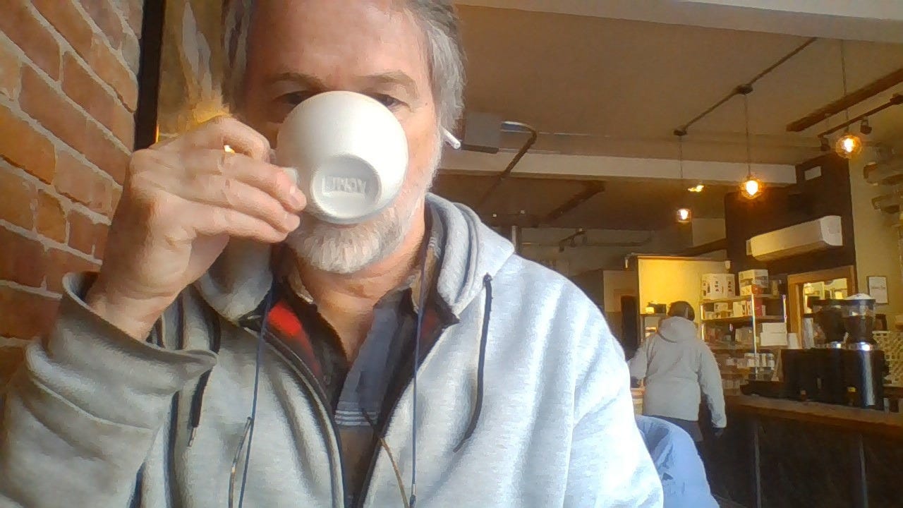 Lance Robinson sipping coffee in St. Paul Roastery Lance Robinson sipping coffee in St. Paul Roastery