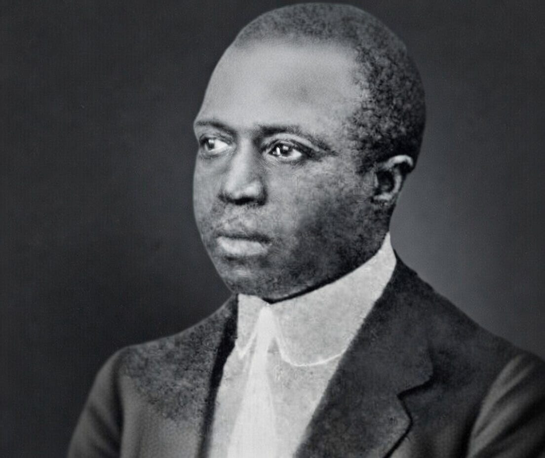 Black-and-white portrait of Scott Joplin, the king of ragtime, gazing directly at the viewer with quiet intensity and dignity—embodying the mattering instinct: the deep human longing to prove one's existence is warranted, even when the world does not affirm it. Black-and-white portrait of Scott Joplin, the king of ragtime, gazing directly at the viewer with quiet intensity and dignity—embodying the mattering instinct: the deep human longing to prove one's existence is warranted, even when the world does not affirm it.