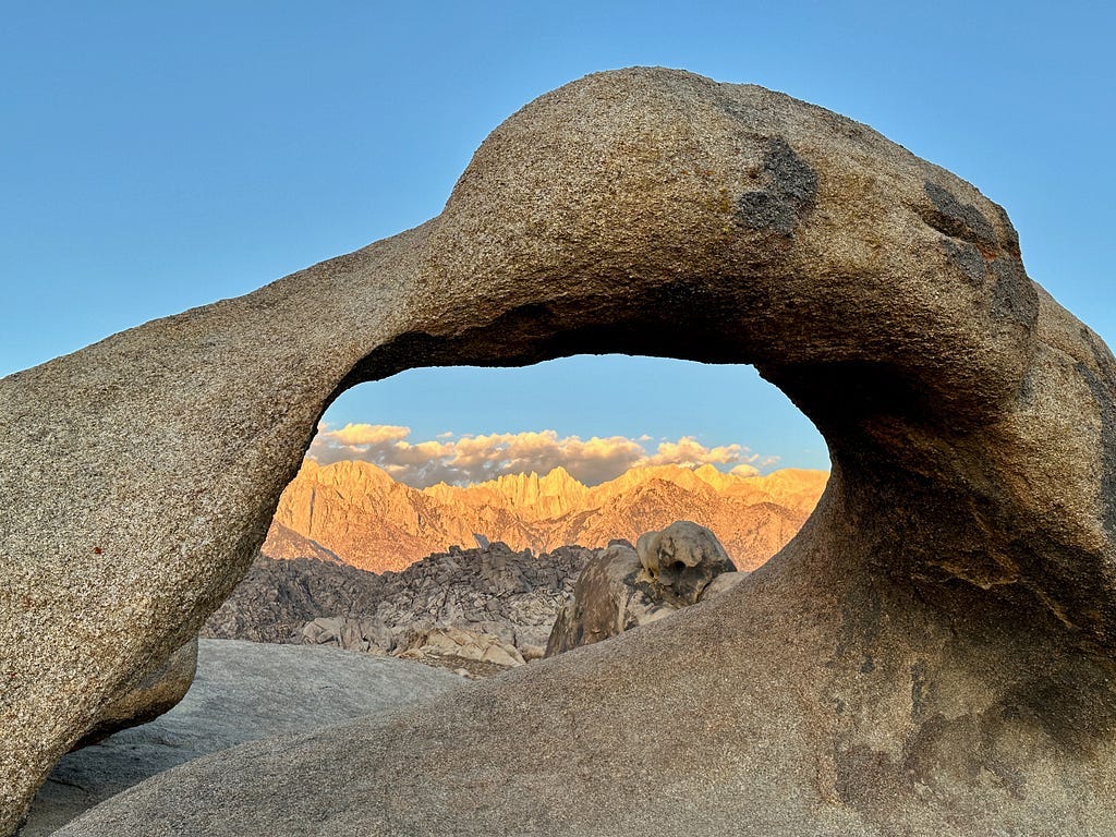 View of Mount Whitney through the Mobius Arch in the Alabama Hills