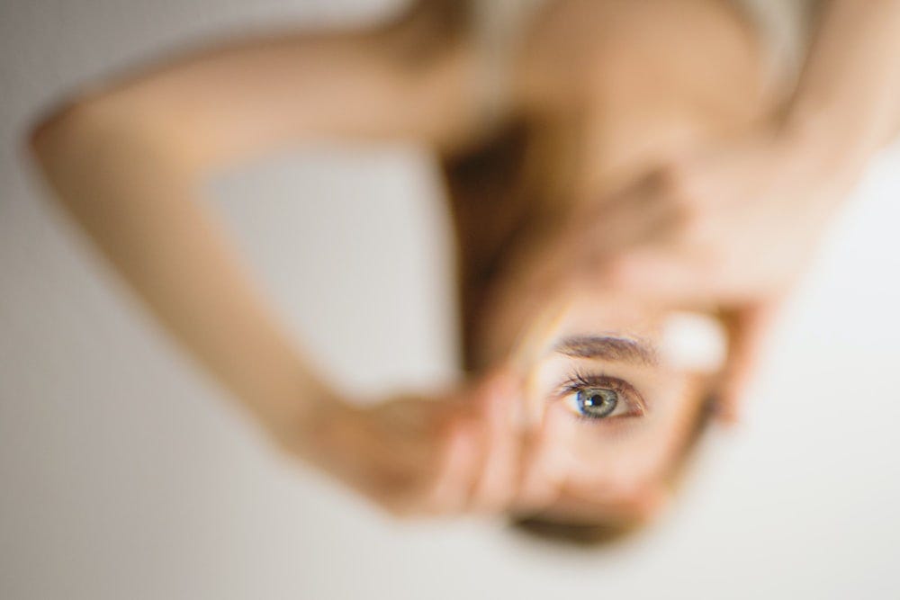 woman holding mirror woman holding mirror