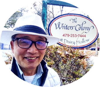 A person in a hat and glasses smiling

AI-generated content may be incorrect.