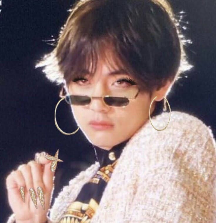 Edit of Kim Taehyung with glittery, pointy gold nails, false lashes, and gold hoop earrings