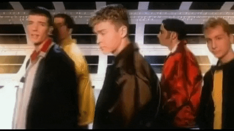 They're all on the treadmill in the space hallway, walking slowly, except Chris, who is bobbing his shoulders up and down wildly for some reason.