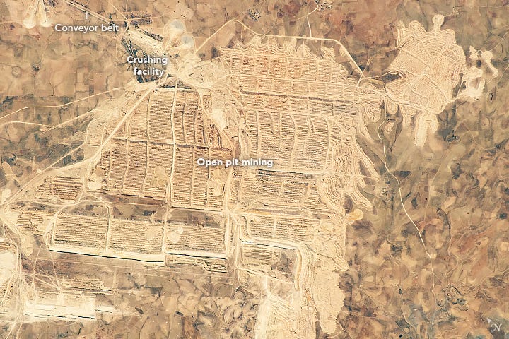 another satellite image, of an open cast mine. it isn't pretty.