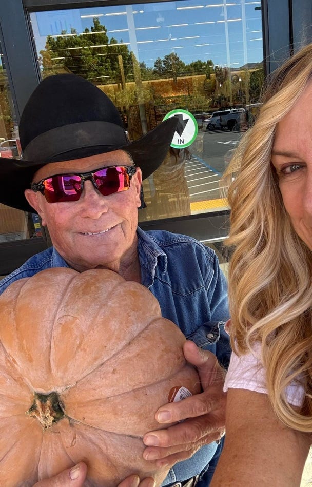 A person holding a pumpkin

AI-generated content may be incorrect.