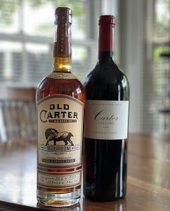 Sturdy bottles of Old Carter Bourbon and Carter Cellars wine