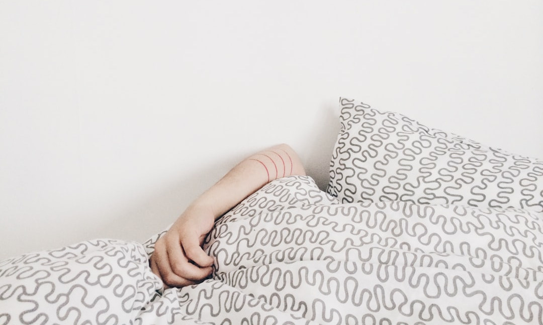person lying on bed person lying on bed