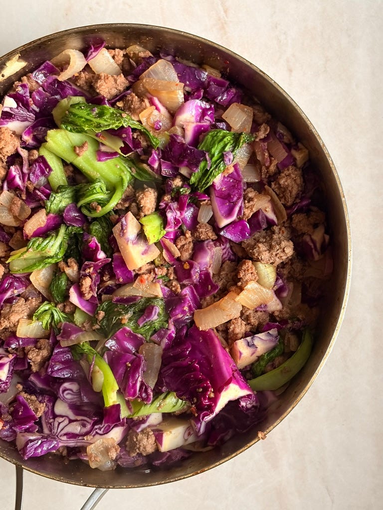 Beef & Bok choy stir fry in a large pan