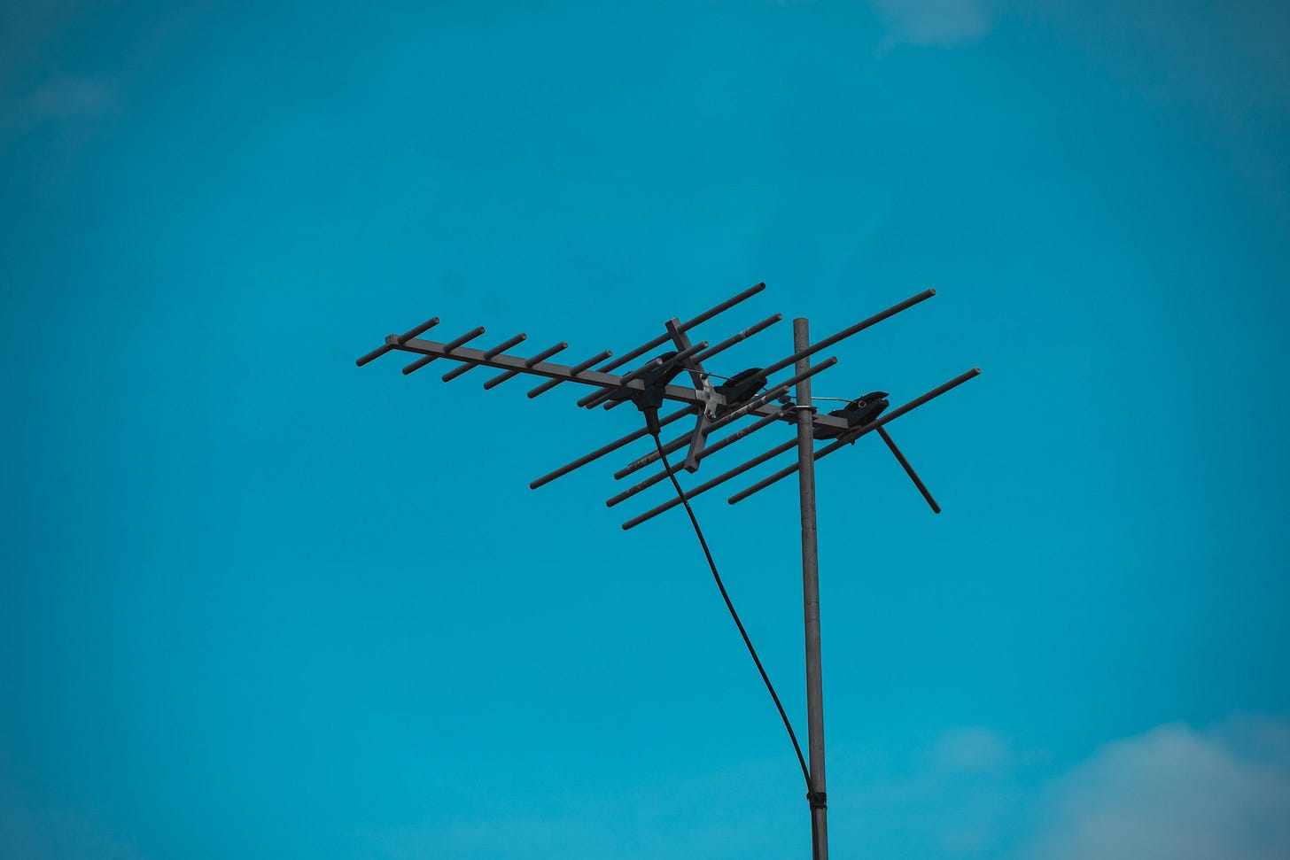 Television Antenna Against Blue Sky Television Antenna Against Blue Sky